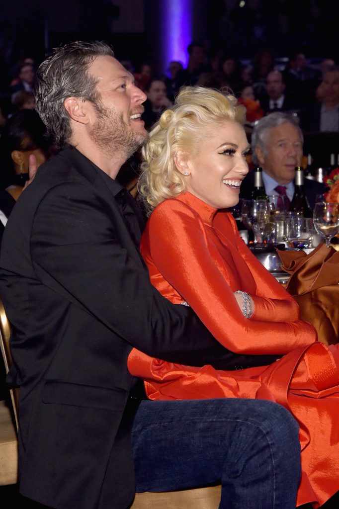 Blake Shelton Holds Gwen Stefani at The 2016 Pre-GRAMMY Gala and Salute To Icons
