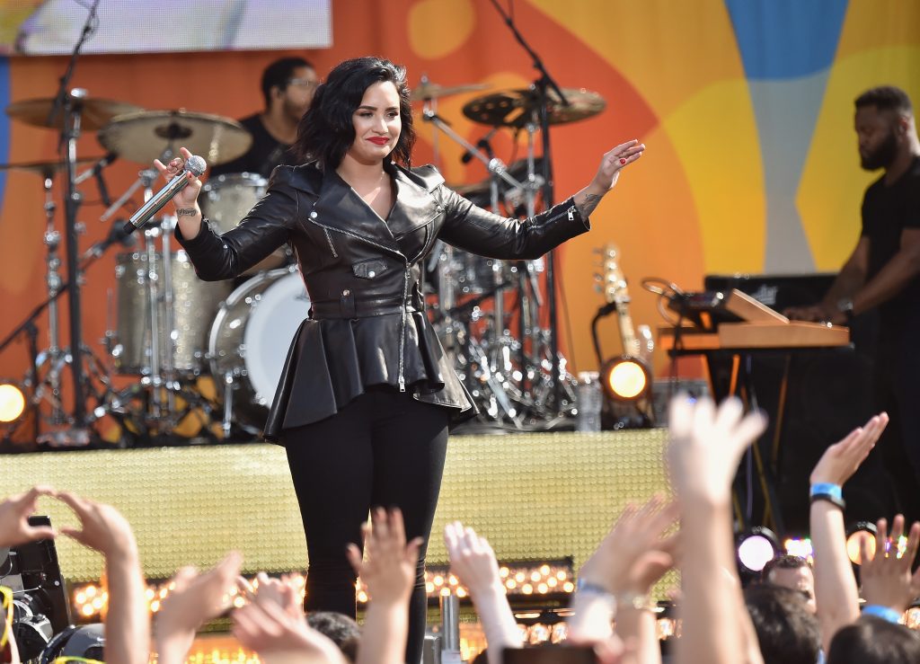 Demi Lovato Enjoys Applause