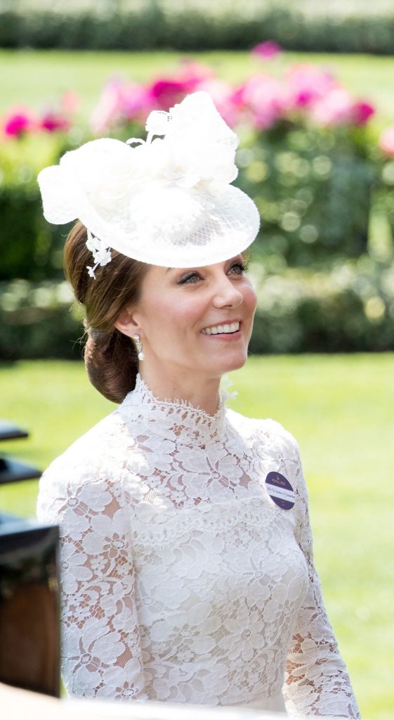 Kate Middleton Smiles in White