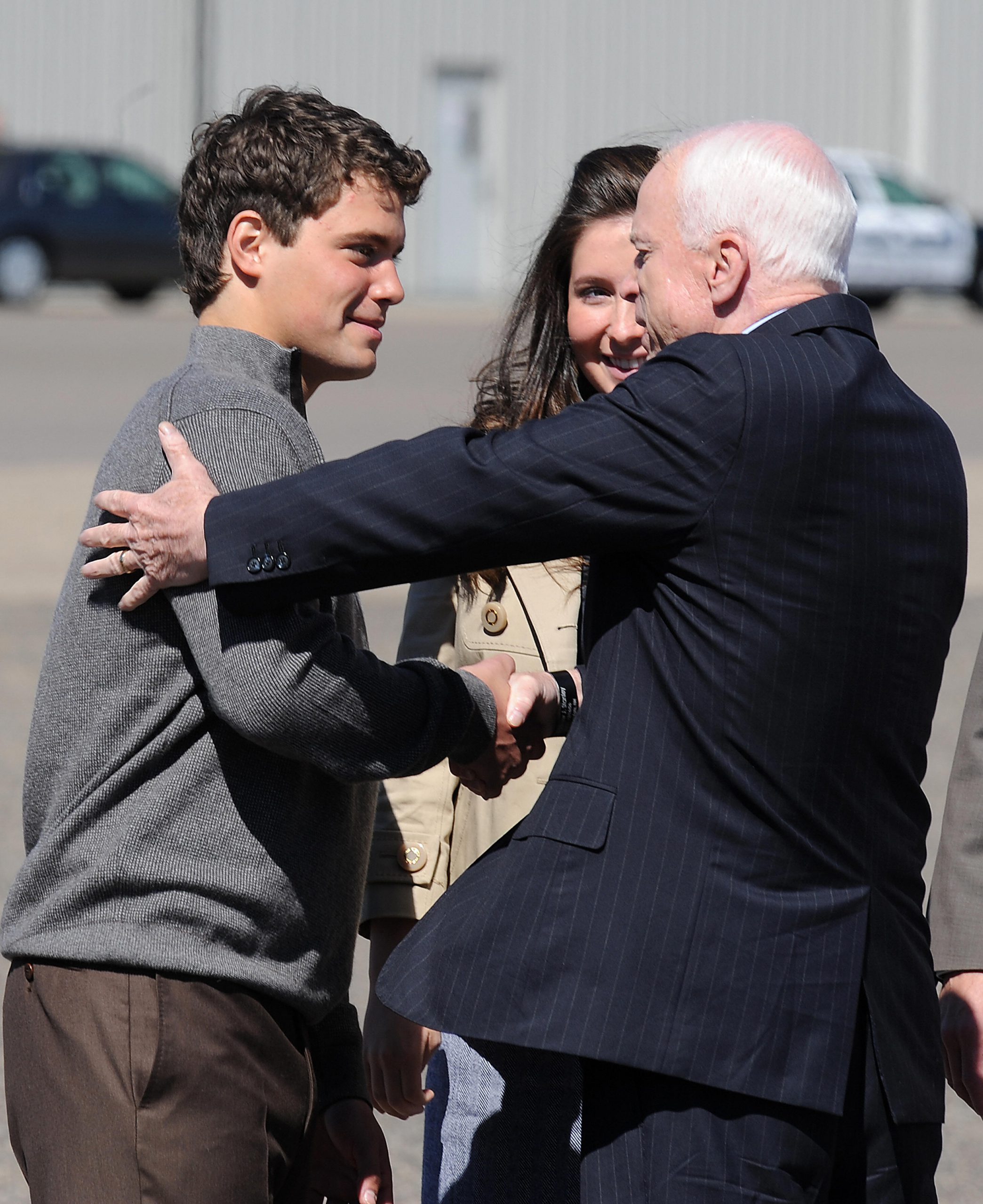 And Here He Is Shaking Hands with Presidential Candidate John McCain
