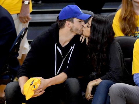 Ashton and Mila Kiss