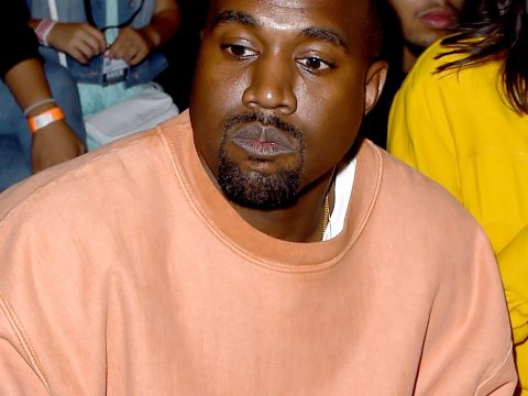 Kanye West in Orange Sweatshirt