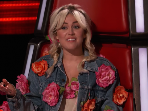 Miley Cyrus in a Red Chair