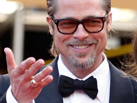 Brad Pitt Wearing Glasses and Smiling