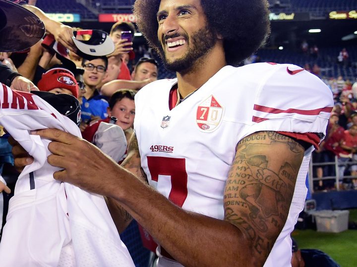 Colin Kaepernick Kneels During Anthem, Makes $1 Million Pledge