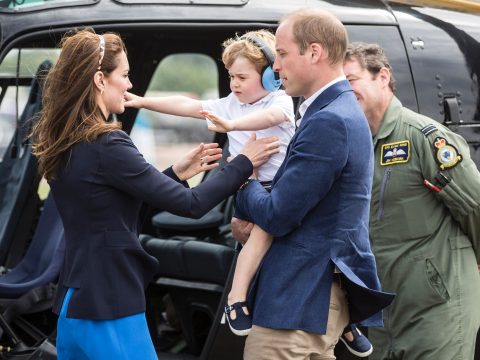 Prince George Reaches For Kate Middleton