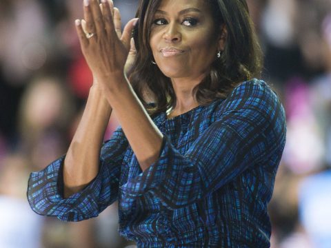 Michelle Obama Claps