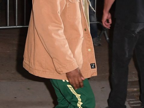 Kanye West in a Tan Jacket and Green Pants Photo