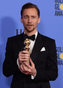 Tom Hiddleston Holds His Globe