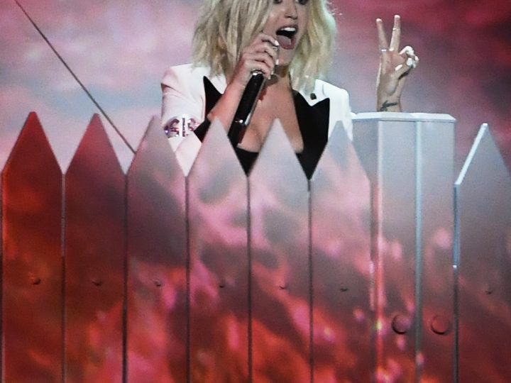 Katy Perry Behind a Fence