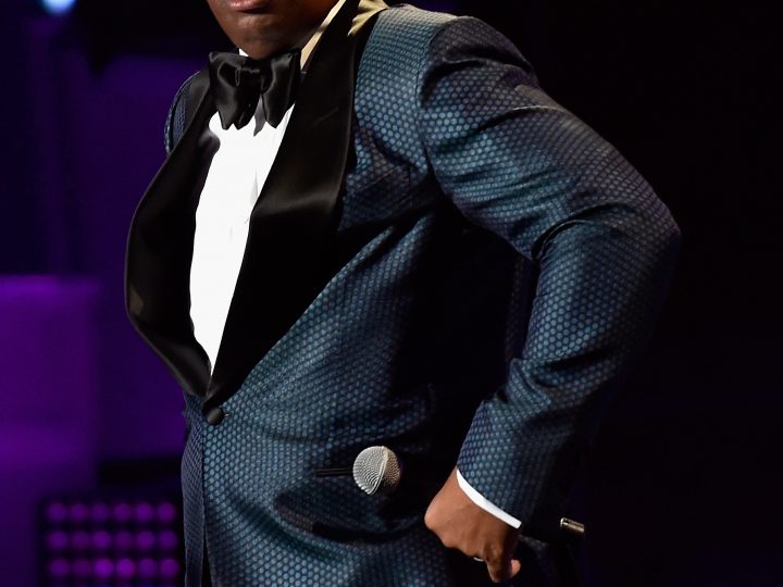 Steve Harvey Adjusts Pants