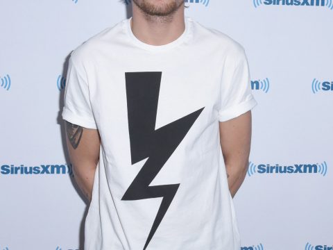 Louis Tomlinson Looks Serious
