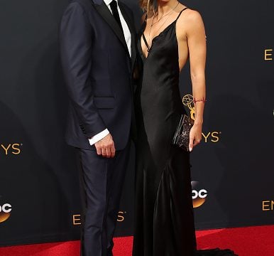 Zoe Buckman and David Schwimmer attend Emmys