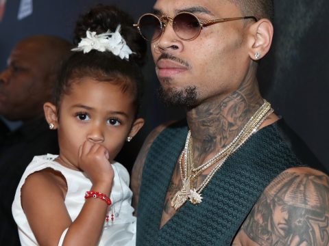 Chris Brown Cradles Royalty