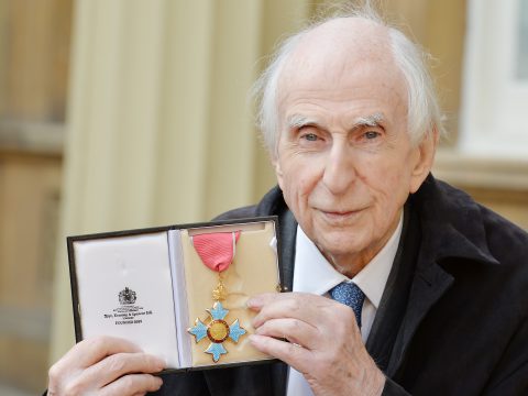 Michael Bond with his Order of the British Empire