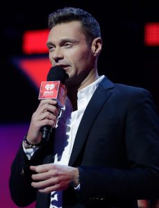 Ryan Seacrest on a Mic