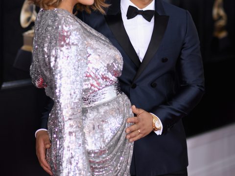 John Legend Cradles Chrissy Teigen's Baby Bump