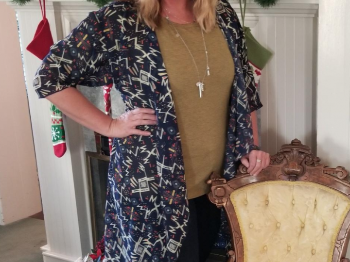 Meri Brown Poses With a Chair