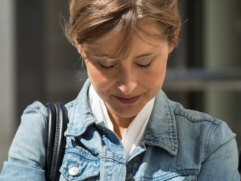 Allison Mack Hangs Her Head