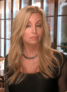 Camille Grammer Grins