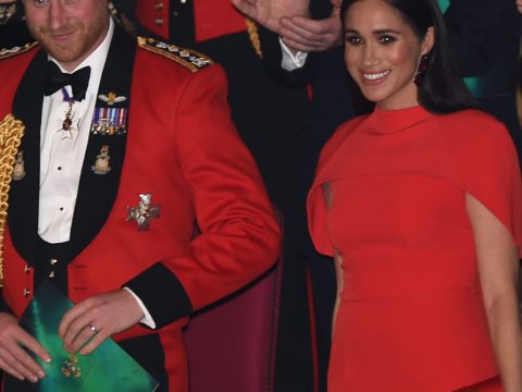 Prince Harry and Meghan Markle in Red