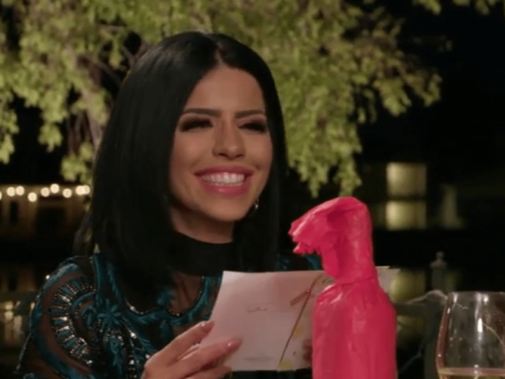 Larissa Lima Smiles at a Card