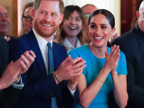 Meghan Markle and Prince Harry Clap