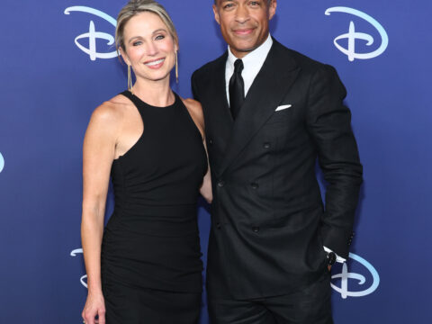 Amy Robach and T.J. Holmes on a red carpet