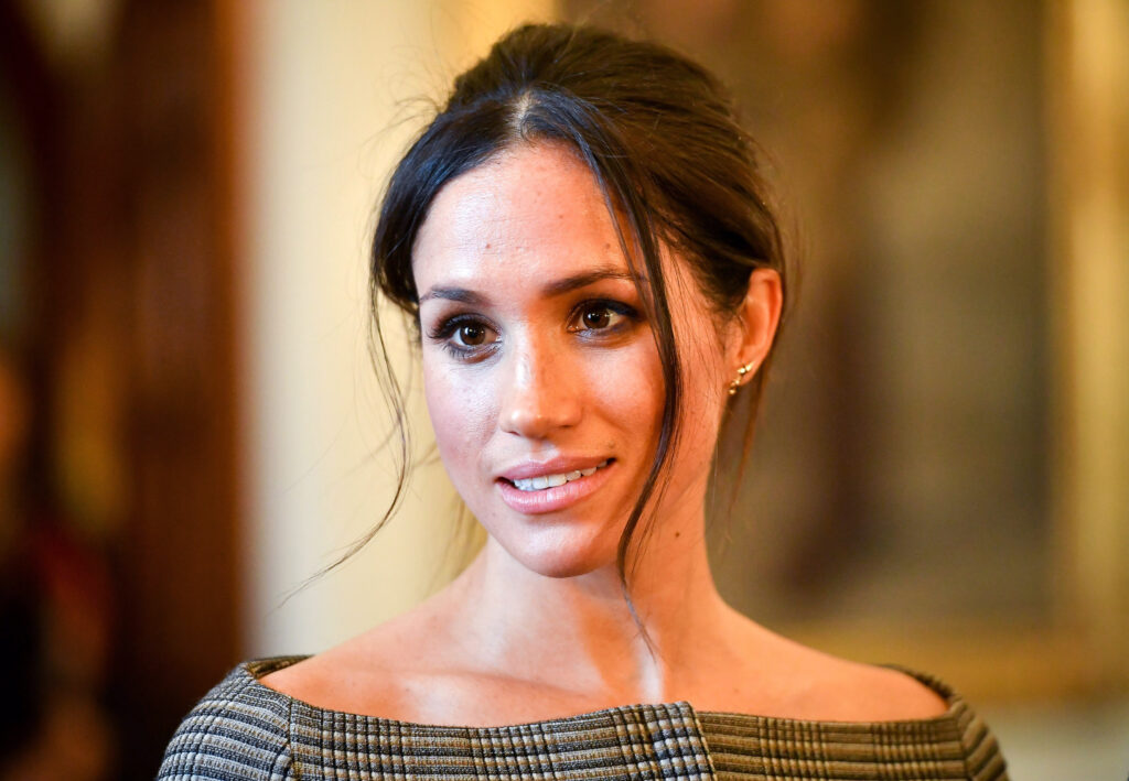 Meghan Markle speaks with supporters during a visit to Wales.