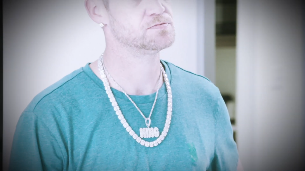 Justin Stroud wearing expensive chains.