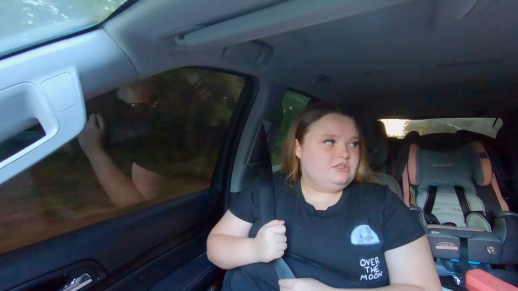 Alana Thompson wearing a seatbelt.