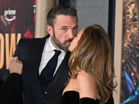 Jennifer Lopez and Ben Affleck kiss as they attend Amazon's 