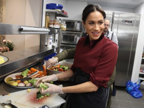 Meghan Markle cooking in the kitchen