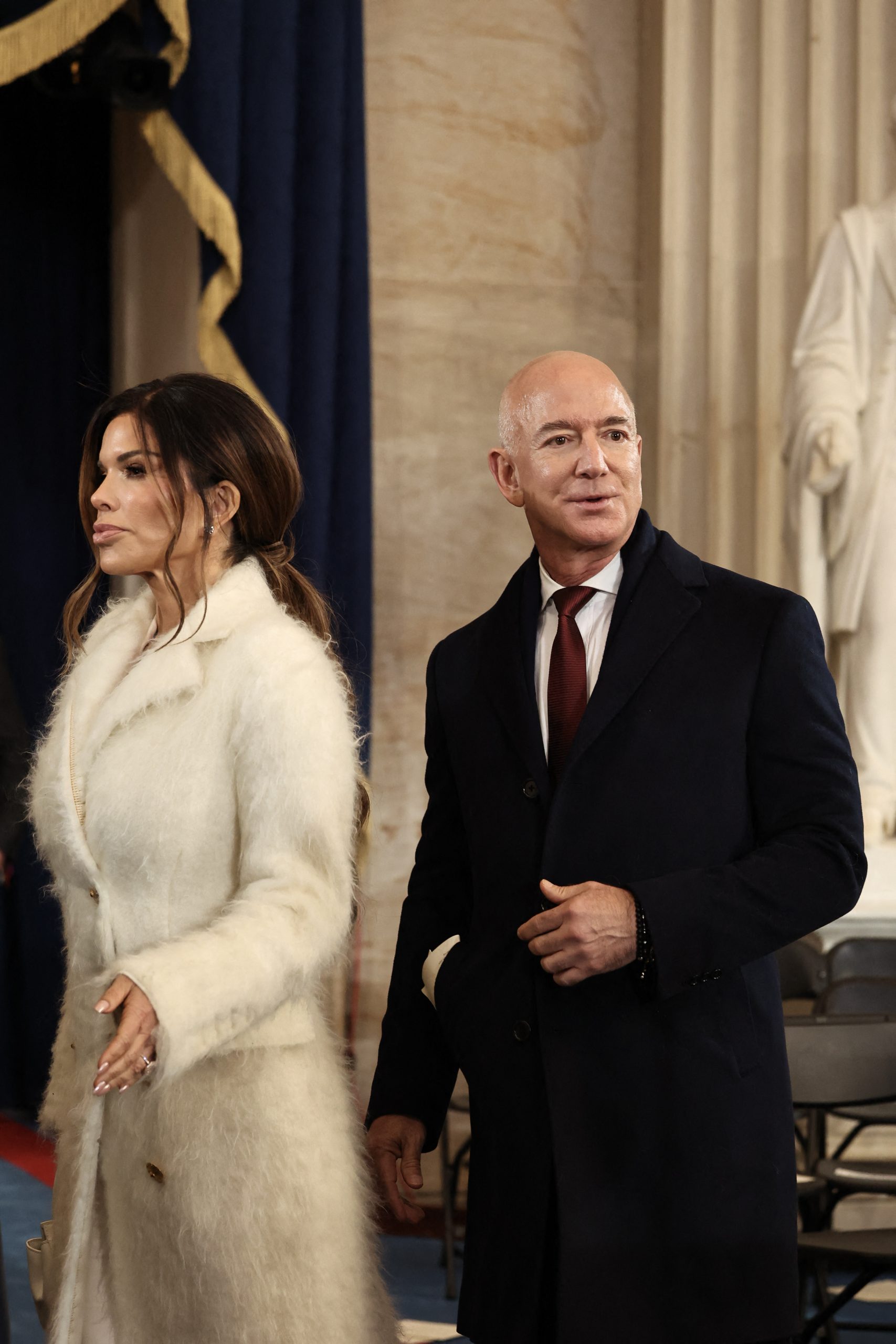 Founder of Amazon and Blue Origin Jeff Bezos and his fiance Lauren Sanchez depart inauguration ceremonies in the Rotunda of the US Capitol on January 20, 2025 in Washington, DC. Lauren Sanchez: Who Is Jeff Bezos’ New Wife? (And Which NFL Legend Is Her Baby …