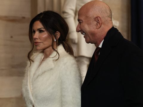 Founder of Amazon and Blue Origin Jeff Bezos and his fiance Lauren Sanchez depart inauguration ceremonies in the Rotunda of the US Capitol on January 20, 2025 in Washington, DC.