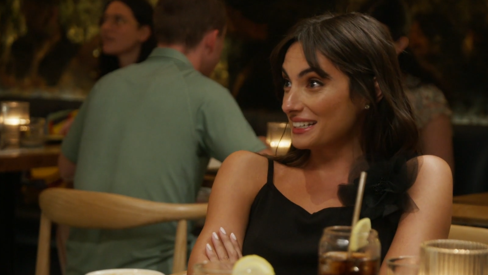 Paige DeSorbo makes expressive facial expressions in Season 9 of Summer House.