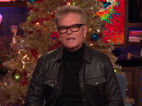 Harry Hamlin on Watch What Happens Live, with WWHL's holiday decor behind him.
