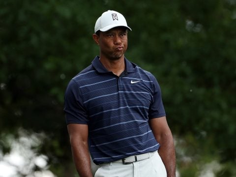 Tiger Woods of the United States reacts to his shot from the fourth tee during the second round of the 2023 Masters Tournament at Augusta National Golf Club on April 07, 2023 in Augusta, Georgia.