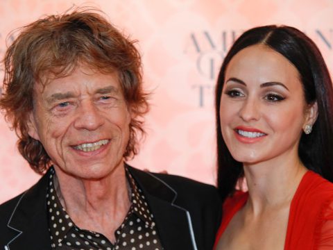 English singer Mick Jagger and his wife US choreographer Melanie Hamrick attend the 2023 American Ballet Theatre's summer season opening night performance of 