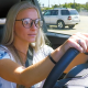 Mackenzie McKee wears glasses and drives.