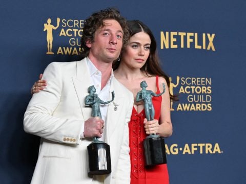 US actor Jeremy Allen White and actress Molly Gordon pose with the awards for Outstanding Performance by a Male Actor in a Comedy Series (Allen White) and Outstanding Performance by an Ensemble in a Comedy Series for 