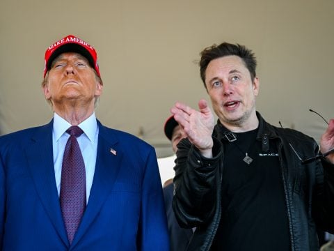 Elon Musk speaks with U.S. President-elect Donald Trump as they watch the launch of the sixth test flight of the SpaceX Starship rocket on November 19, 2024 in Brownsville, Texas.