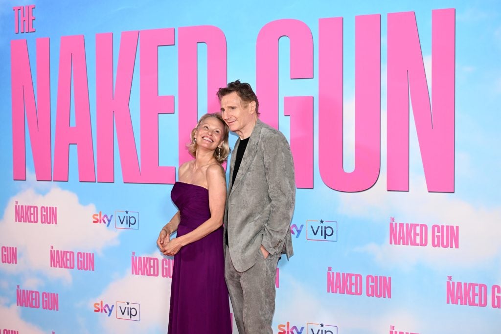 Pamela Anderson and Liam Neeson together at a premiere.
