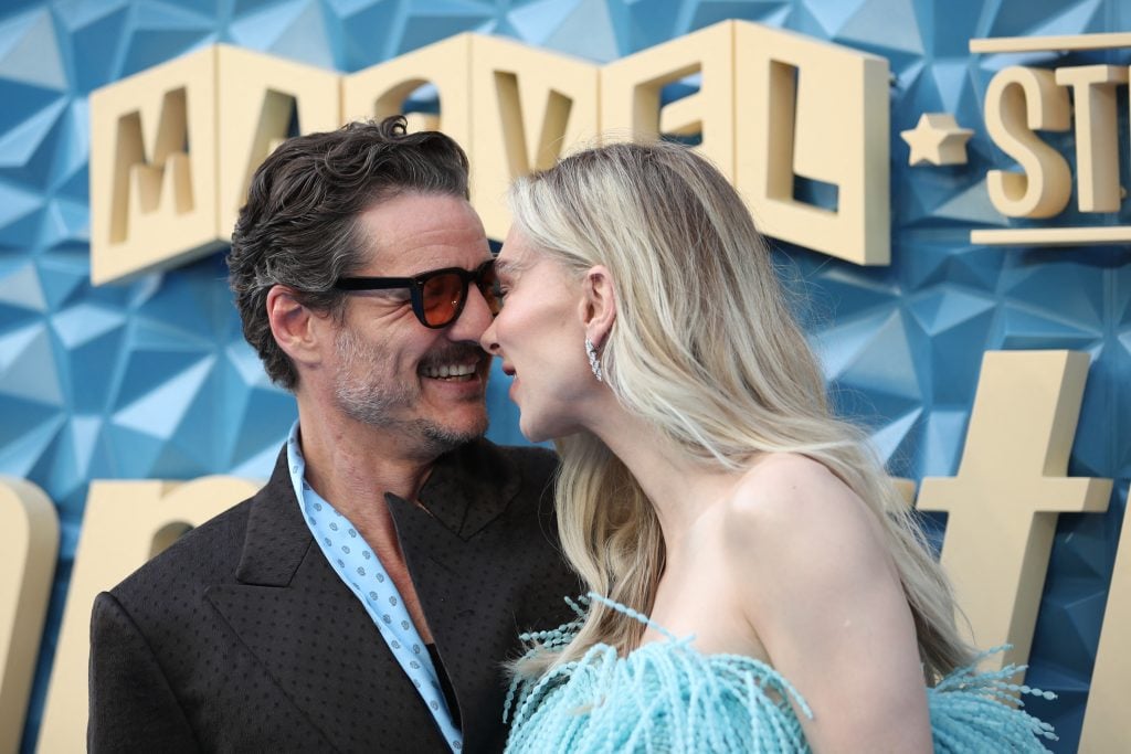 Pedro Pascal and Vanessa Kirby nose to nose.