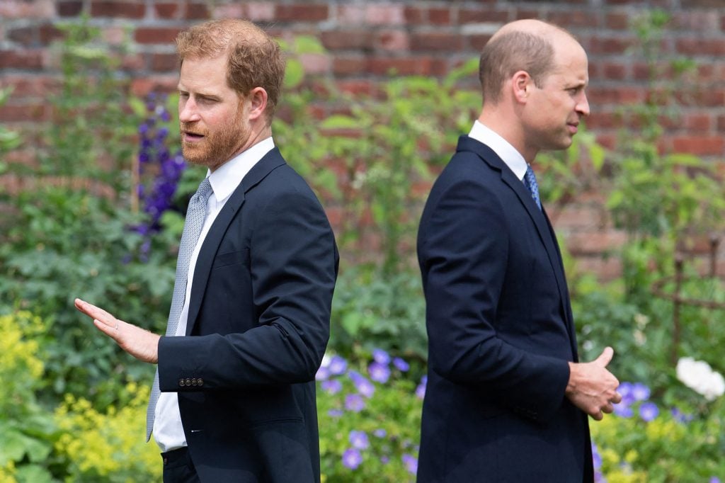 Britain's Prince Harry, Duke of Sussex and Britain's Prince William, Duke of Cambridge attend the unveiling of a statue of their mother, Princess Diana at The Sunken Garden in Kensington Palace, London on July 1, 2021, which would have been her 60th birthday.