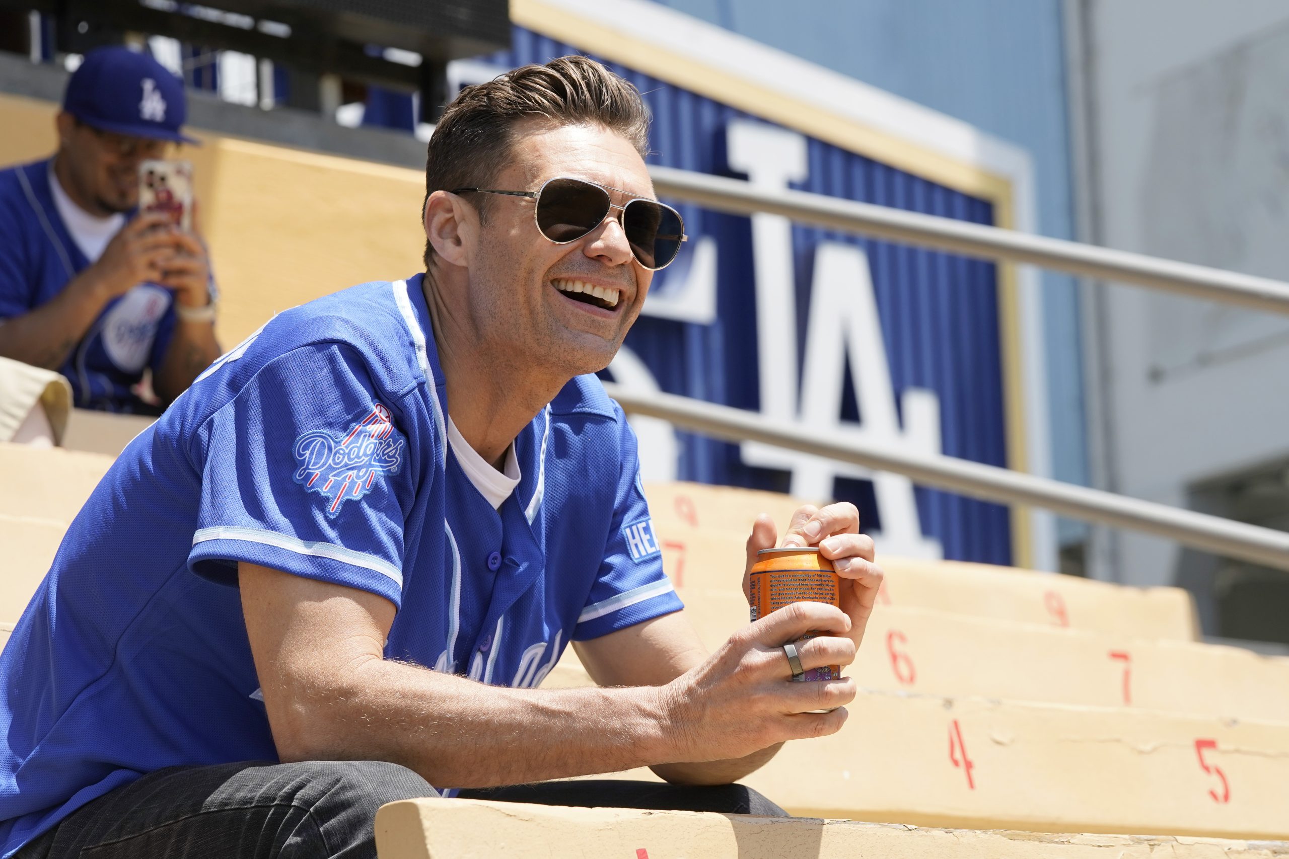 In this image released on June 26, Ryan Seacrest partners with Health-Ade to bring kombucha to LA Dodger Fans at Dodger Stadium on May 17, 2023 in Los Angeles, California. Ryan Seacrest Frightens Fans With ‘Frail’ Appearance