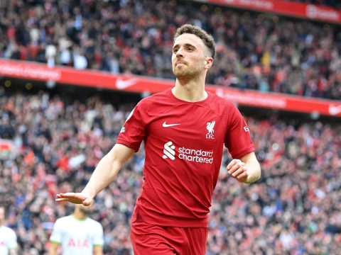 Diogo Jota of Liverpool celebrates after scoring the team's fourth goal during the Premier League match between Liverpool FC and Tottenham Hotspur at Anfield on April 30, 2023 in Liverpool, England.