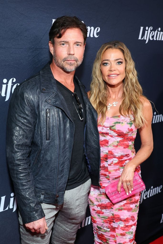 Aaron Phypers and Denise Richards attend the Tempted by Love Premiere Event Presented by Terry McMillan at IPIC Westwood on August 08, 2024 in Los Angeles, California.