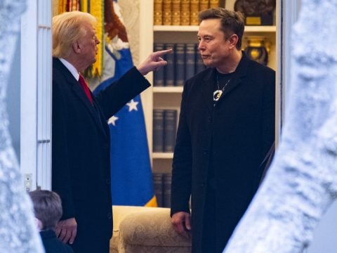 Donald Trump and Elon Musk speak before departing the White House on his way to his South Florida home in Mar-a-Lago in Florida on March 14, 2025.
