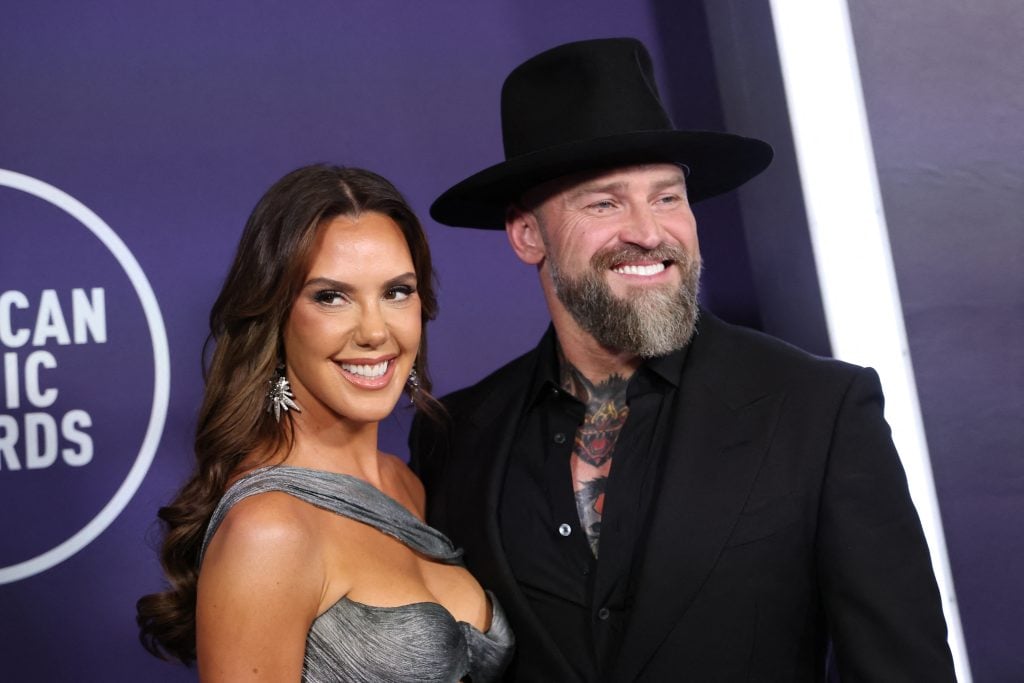 US country singer Zac Brown and US jewelry designer Kendra Scott arrive for the 51st American Music Awards at the Fontainebleau in Las Vegas, Nevada on May 26, 2025.